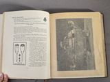 someone is holding a book open to a page with a drawing on it