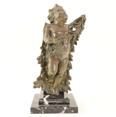 statue of an angel holding a harp on a marble base