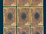 nine squares of different colors with a black hole in the middle