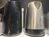 many different types of appliances sitting on a shelf