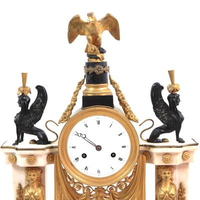 a clock that is sitting on top of a table