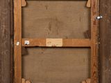 an old picture frame with a piece of paper taped to it