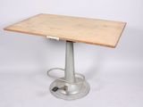 a wooden table with a metal base on a white background