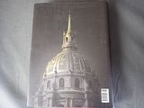 a book with a picture of a building on it