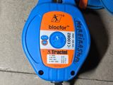 a close up of a blue and orange corded device