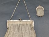 an antique silver mesh purse and matching earrings