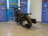 a motorcycle that is parked in a showroom