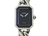 a watch with a chain around it that has a blue face
