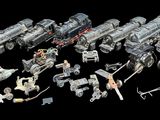a lot of toy vehicles that are on a black background