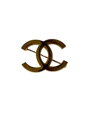 Broche CHANEL CC, fantaisie en métal doré