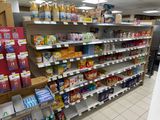 a lot of drinks on the shelves in the store