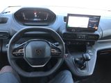 the interior of a car with a steering wheel, dashboard, and dash board