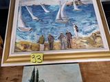 a picture of a painting on a table next to a picture of a sailboat