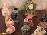 a lot of figurines that are on the table
