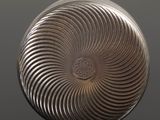 a silver object that is sitting on a black surface