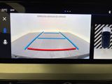 a picture of a car ' s rear view camera on the dashboard