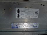 a label on the back of a machine that is not working