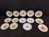 douze assiettes bleues et blanches ornées de portraits