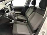 the interior of a car with two seats and a steering wheel