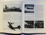 an open book with pictures of military planes on it