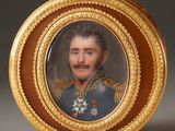 portrait of a man in a military uniform in a gold frame