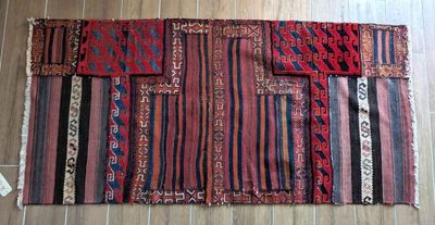 a picture of a piece of cloth on a wooden floor