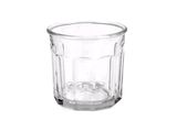 une tasse en verre posée sur une table