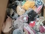 a box full of clothes and other items in it
