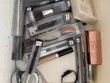 a lot of makeup items in a box on the table