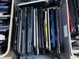 a lot of cell phones that are in the bins