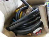 a box with a bunch of hoses inside of it