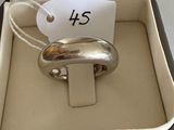 a silver ring in a box with a price tag on it