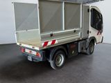 a white truck with a flat bed on the back of it