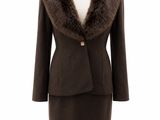 a brown suit with a fur collar on a mannequin mannequin mannequin mannequin mannequin mannequin mannequin manne