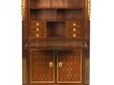an antique wooden cabinet with drawers and drawers on top of it
