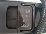 an image of a telephone that is connected to a cord