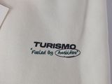 a close up of a white shirt with a tag on it