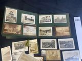 many old photos on a table with a black background