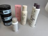 many different types of hair care products on the table