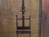 a chair that is sitting on the floor in front of a wall