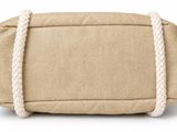 the small bag is made of canvas and has a rope around the handle