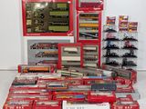 a lot of toy trains on display in a room