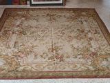 a rug on the floor in a living room