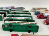 a lot of toy trucks that are sitting on a table