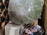 a box full of stuff that is sitting on the floor