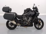 a motorcycle that is parked on the floor in a room