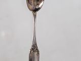 a spoon that is sitting on top of a table