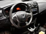 a dashboard of a car with a steering wheel and dashboard controls