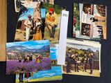 many different pictures of people on a black table