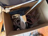 a cardboard box with a bunch of electronics inside of it